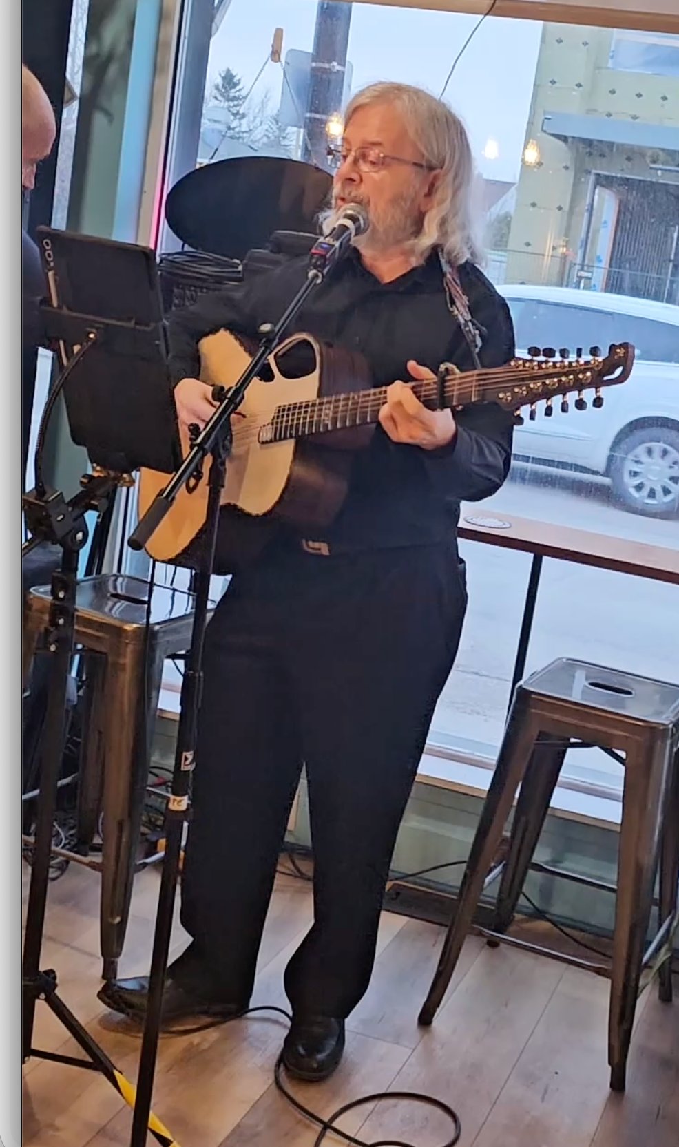 G. Ken Holman performing at open mic