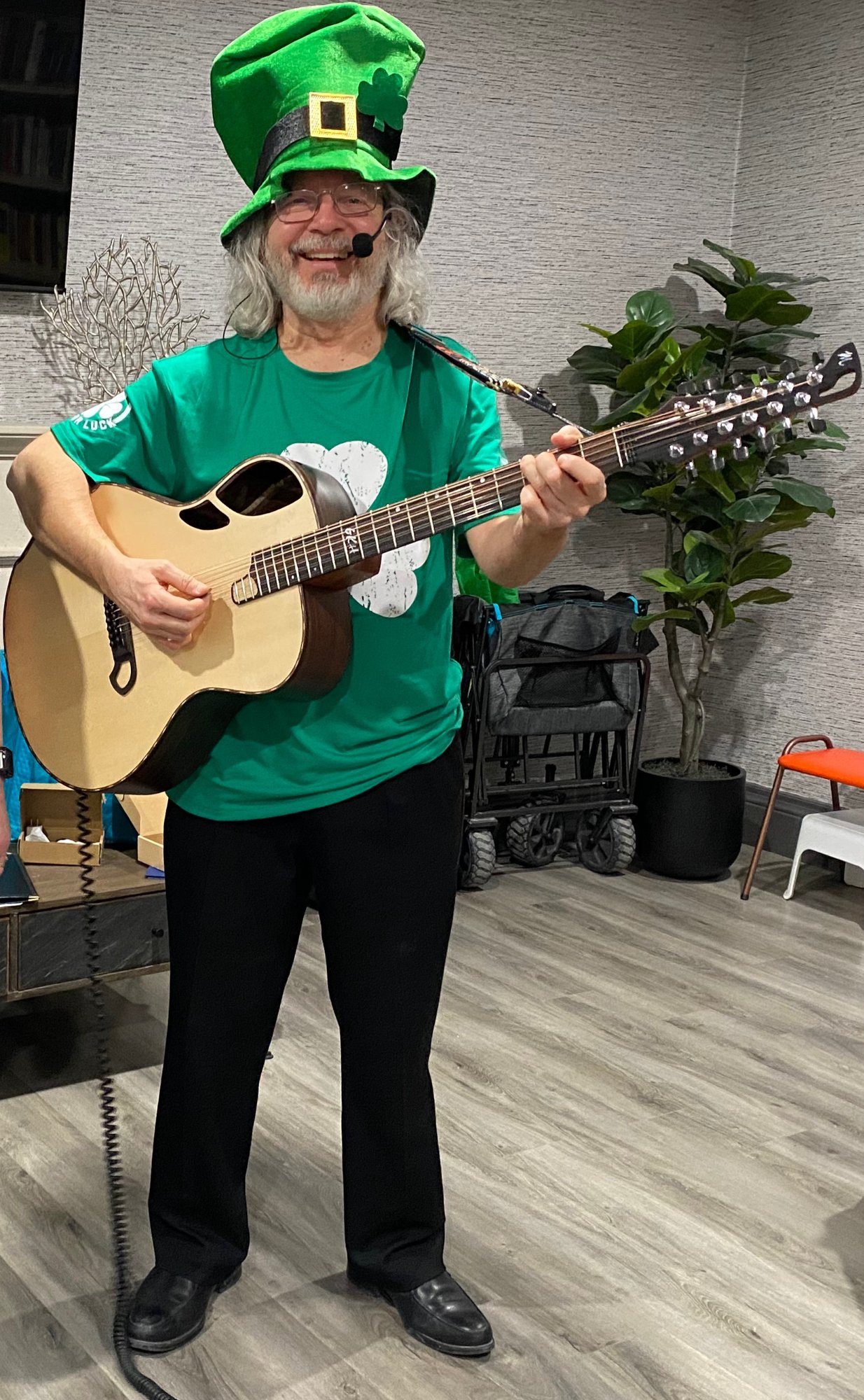 Ken Holman in St. Patrick's Day costume performing